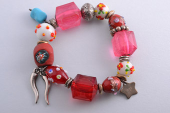 Modern Bracelet With Beads And Charms