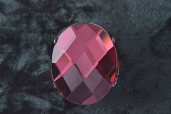 Costume Ring With A Wine-Coloured Faceted Stone