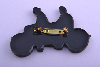 Plastic Tandem Brooch