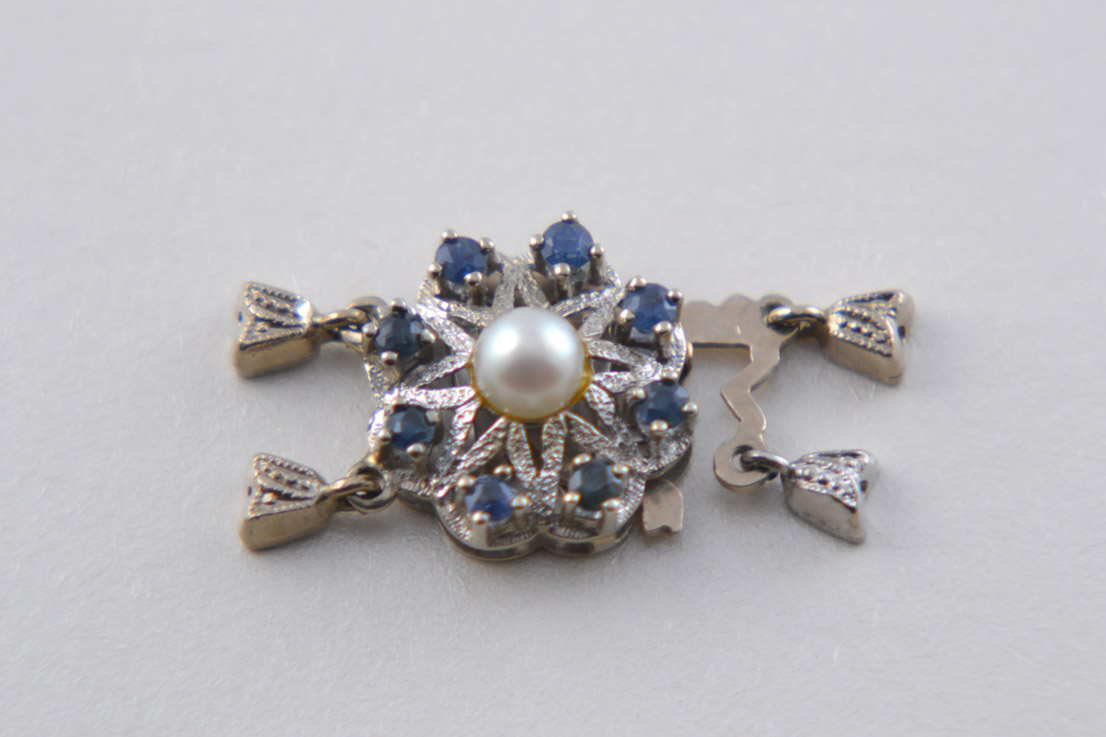 Gold 60's Clasp With Blue Sapphires And A Pearl