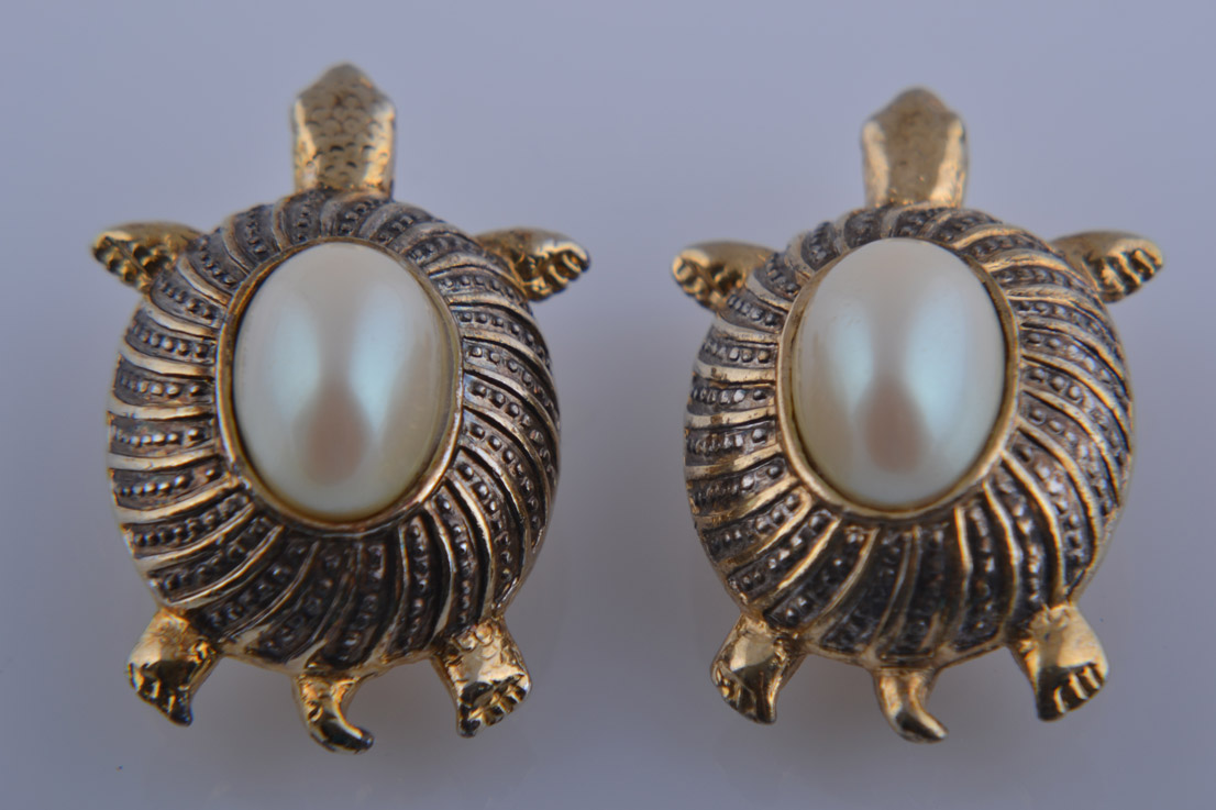 Tortoise clip shop on earrings