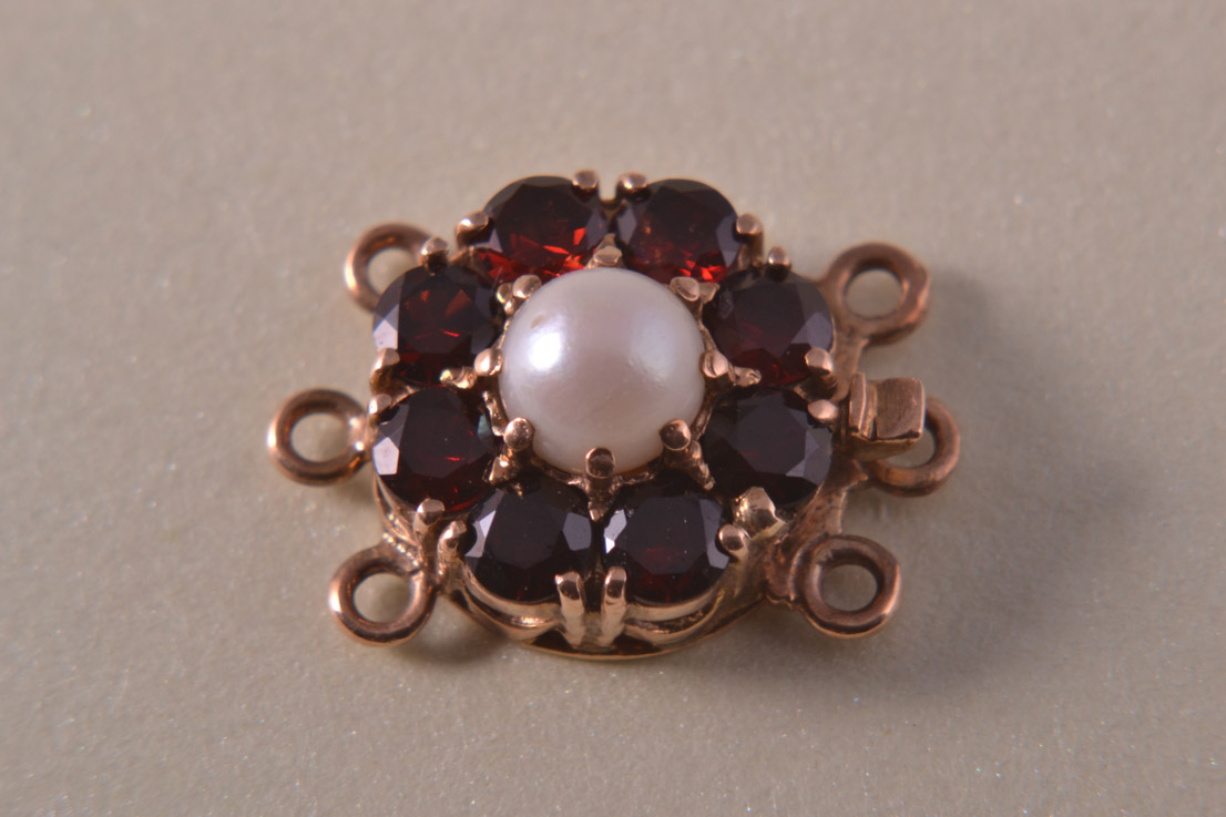 Gold 3 Strand Clasp With Garnets And A Pearl