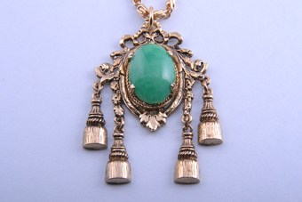 1960's Gilt Pendant With Tassels And Green Stone