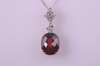 Gold Modern Pendant With Garnet And Diamonds