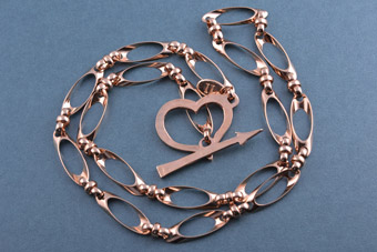 Gilt Modern Chain Necklace With Heart And Arrow Closure