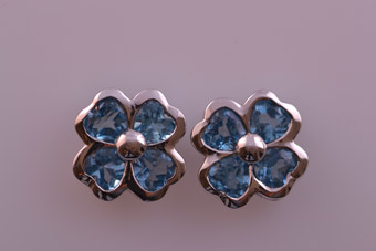 White Gold Modern Stud Earrings With Blue Topaz