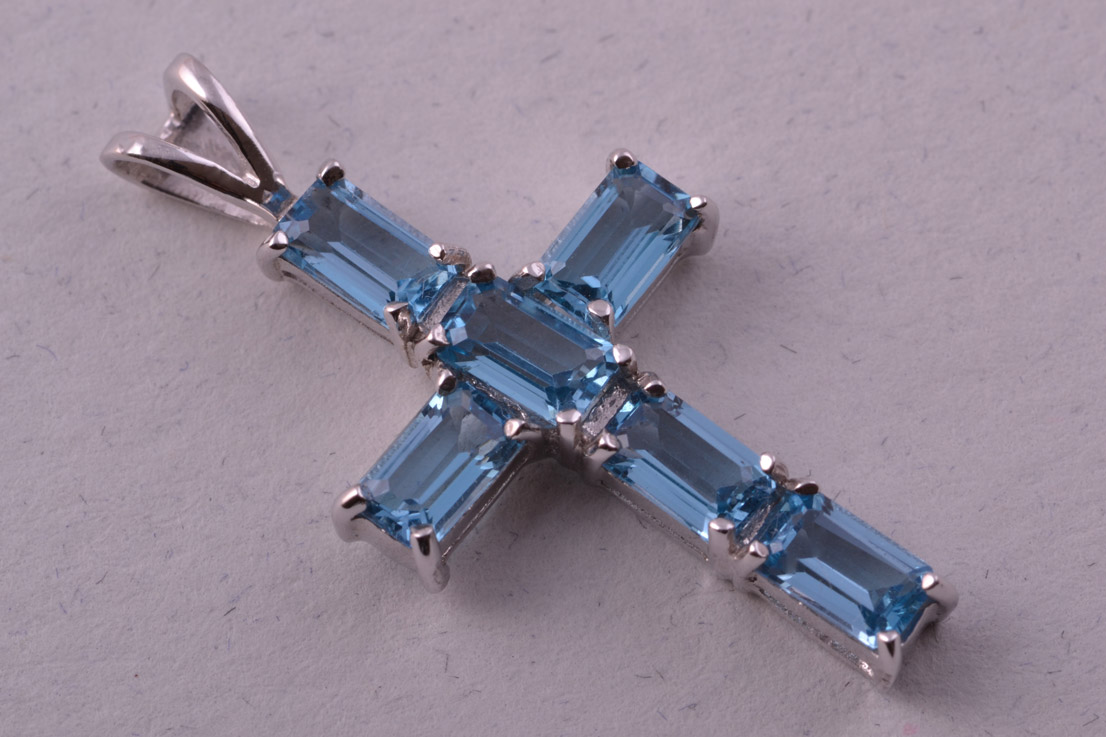9ct White Gold Modern Cross With Blue Topaz