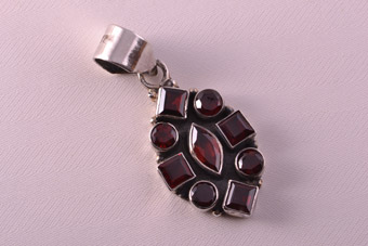 Silver Modern Pendant With Garnets