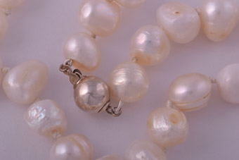 Modern Pearl Necklace With A Silver Clasp
